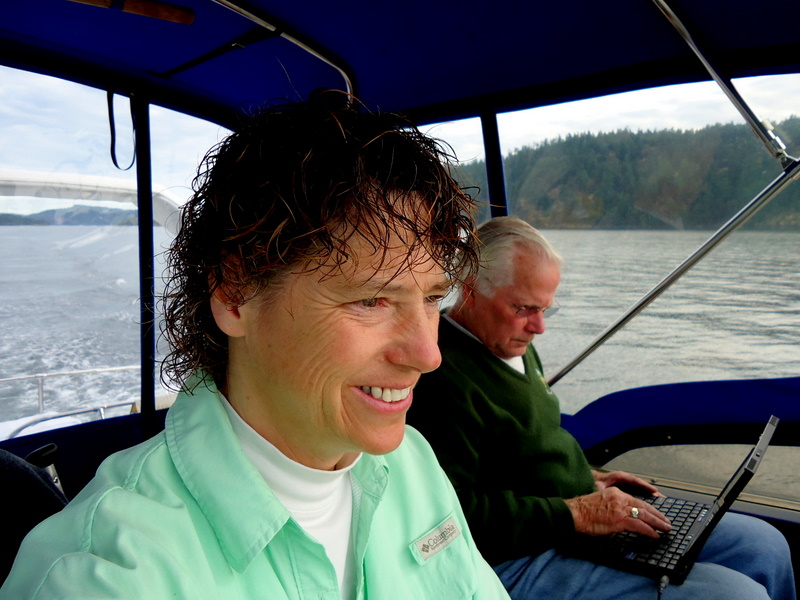 Rebecca and John at work on the bridge. John was busy reconfiguring the router which allowed us more Wi-Fi access this summer, than we have ever had in prior years. Really nice.