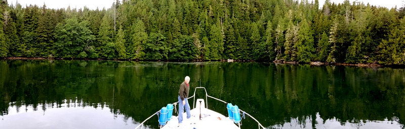 John is checking out the areas to anchor, where another boat just left.