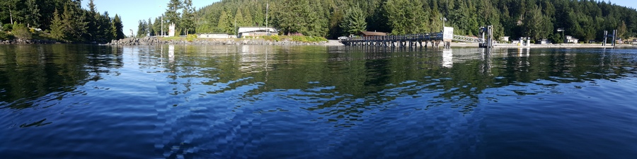 A panoramic view from harbor entrance on the left to the outside fuel dock on the right, of Blakely Island Marina. Going through Peavine Pass right before hanging a sharp right to cross the current and then enter a small opening, was interesting, to say the least.
